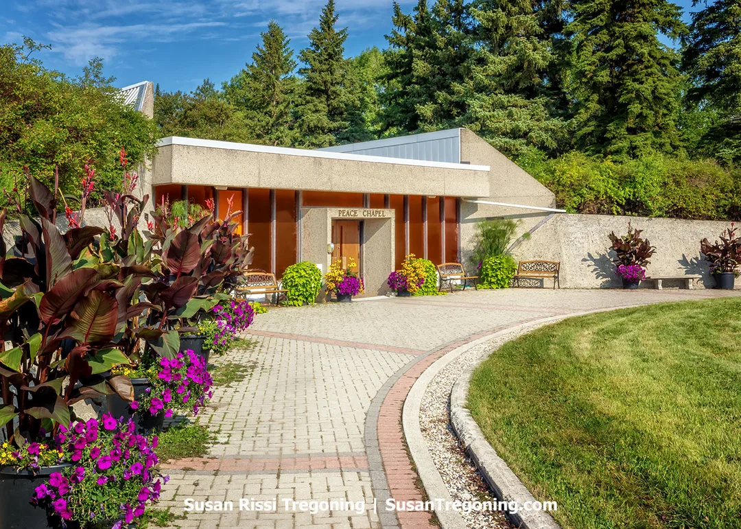 The Peace Chapel at the International Peace Garden, built in 1968 on the North Dakota–Canadian border, features Manitoba limestone walls engraved with quotations on peace and illuminated by soft French colored glass. It serves as one of the Garden’s most contemplative spaces, reflecting its mission of unity, reflection, and hope within the 2,300‑acre cross‑border landscape dedicated to harmony and cooperation.